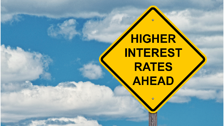 Picture of a road sign saying Higher Interest Rates Ahead