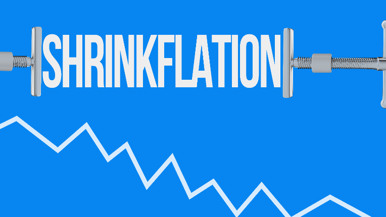 The word shrinkflation on a blue screen