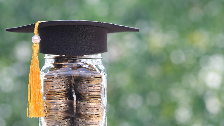 jar of money with graduation cap
